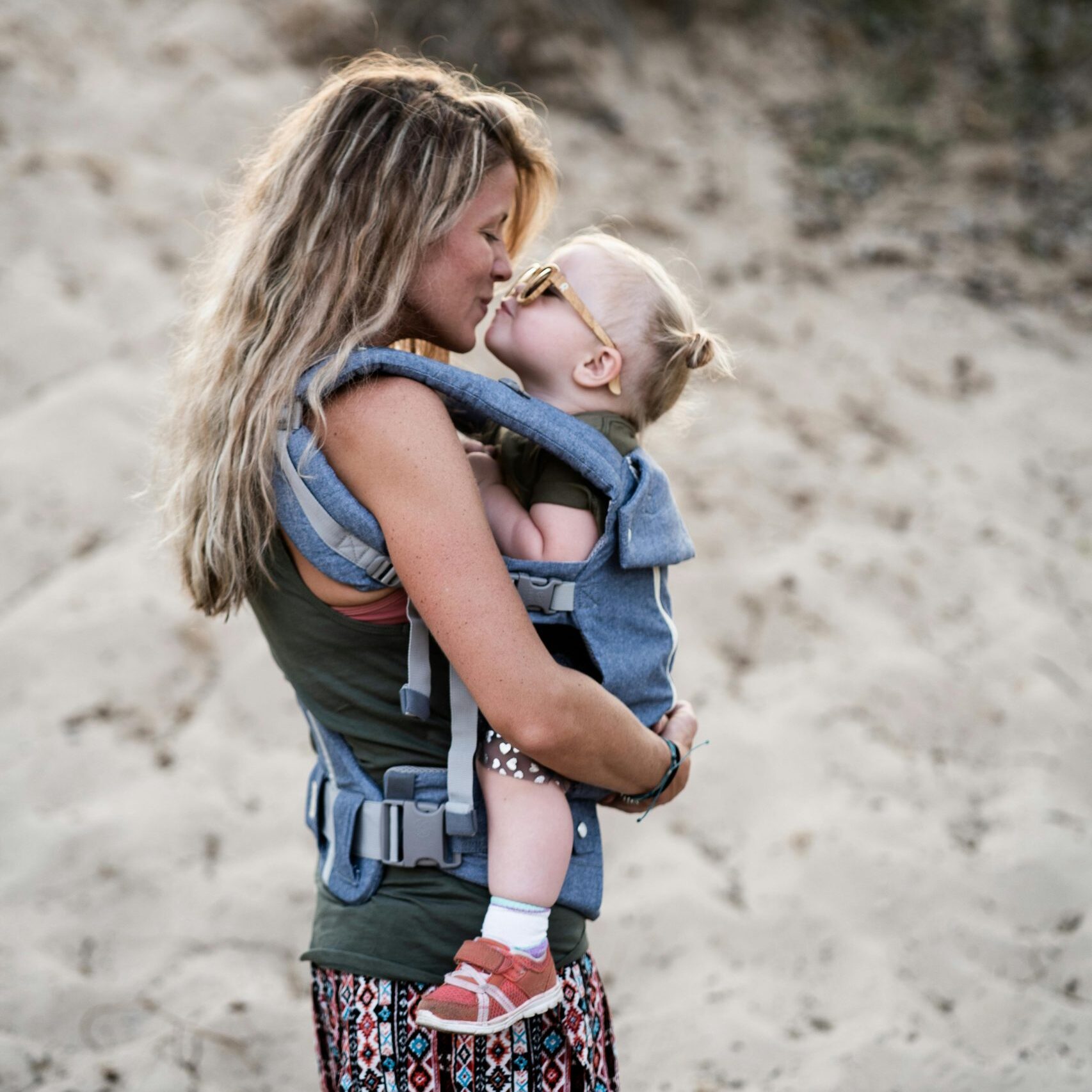 Mother Kissing Her Daughter